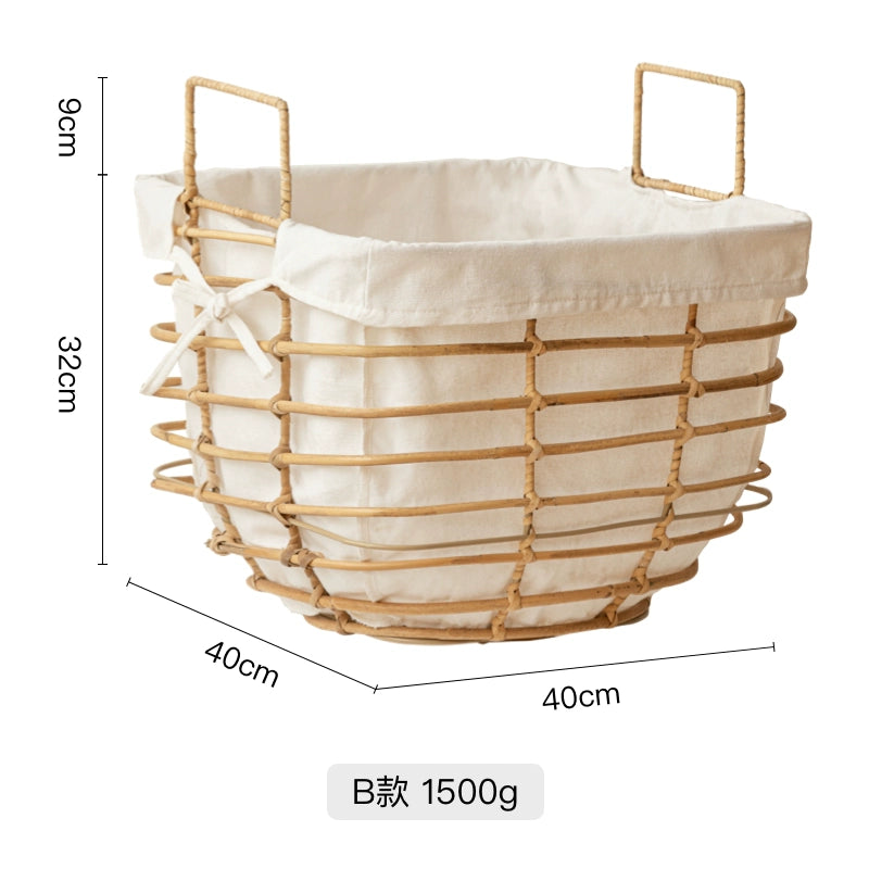 Light beige rattan laundry basket with cream linen liner.  Square shape, metal handles.  Stylish storage.