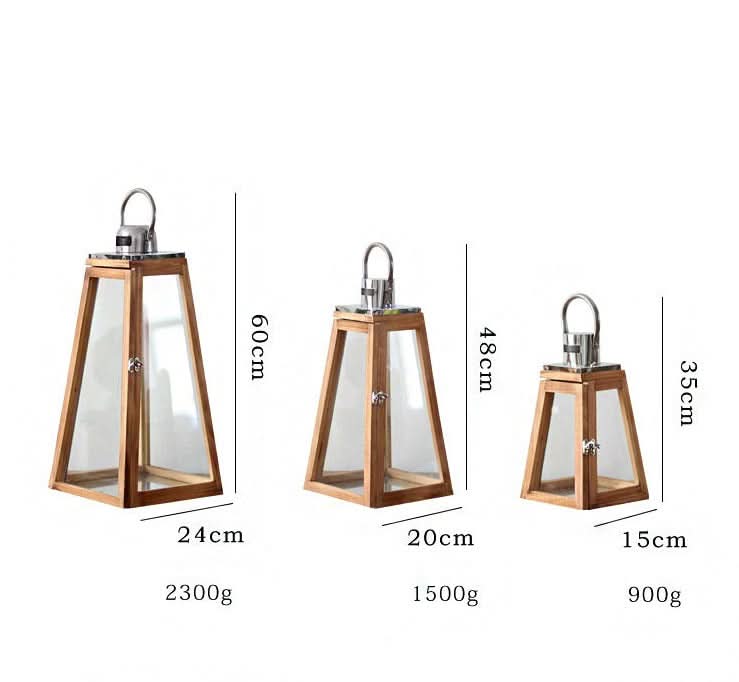 Rustic wooden lantern with glass panes and metal handle, part of a home decor set.