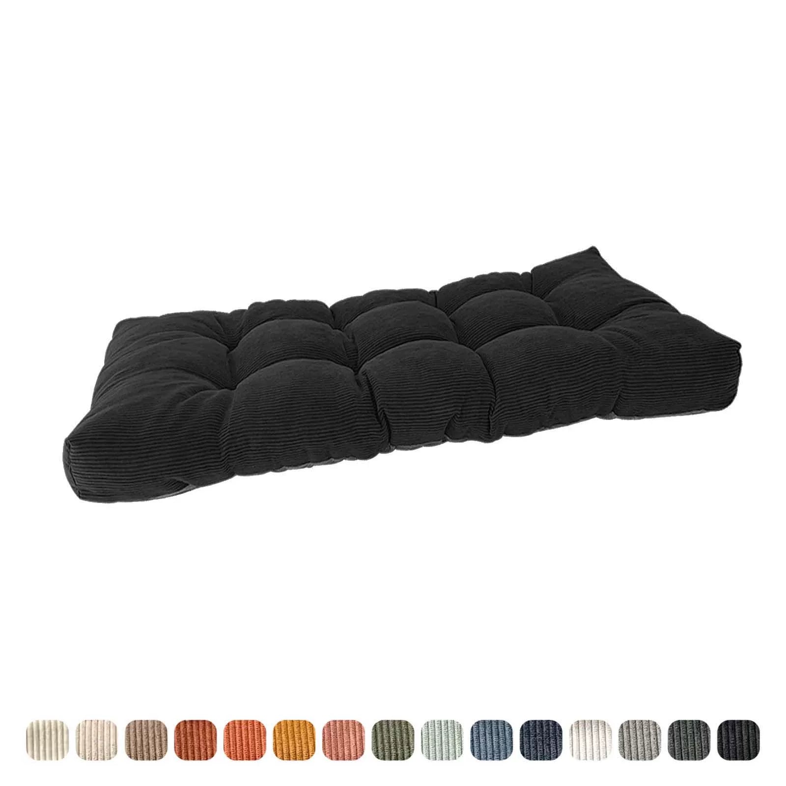 Black tufted corduroy cushion displayed fully extended.