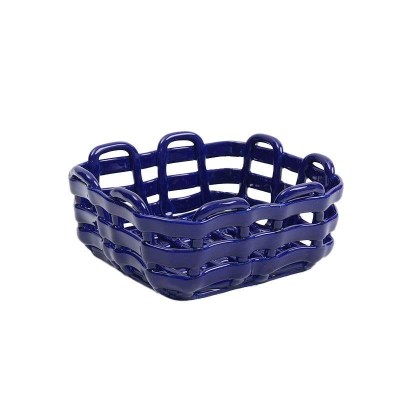 Deep blue woven ceramic fruit basket, square shape, decorative serving dish.