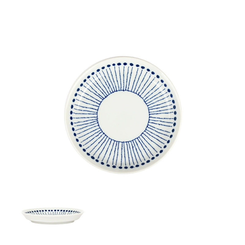 Blue & White Dotted Rim Dinnerware Set: ceramic plate with blue sunburst design on white.