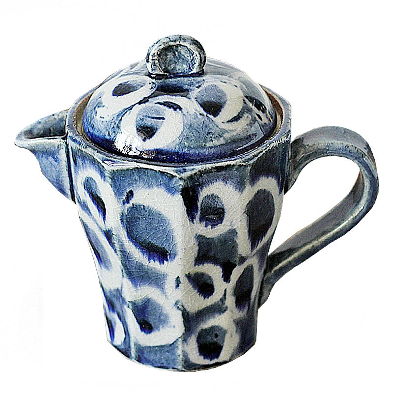 Japanese handmade blue and white ceramic teapot with lid.