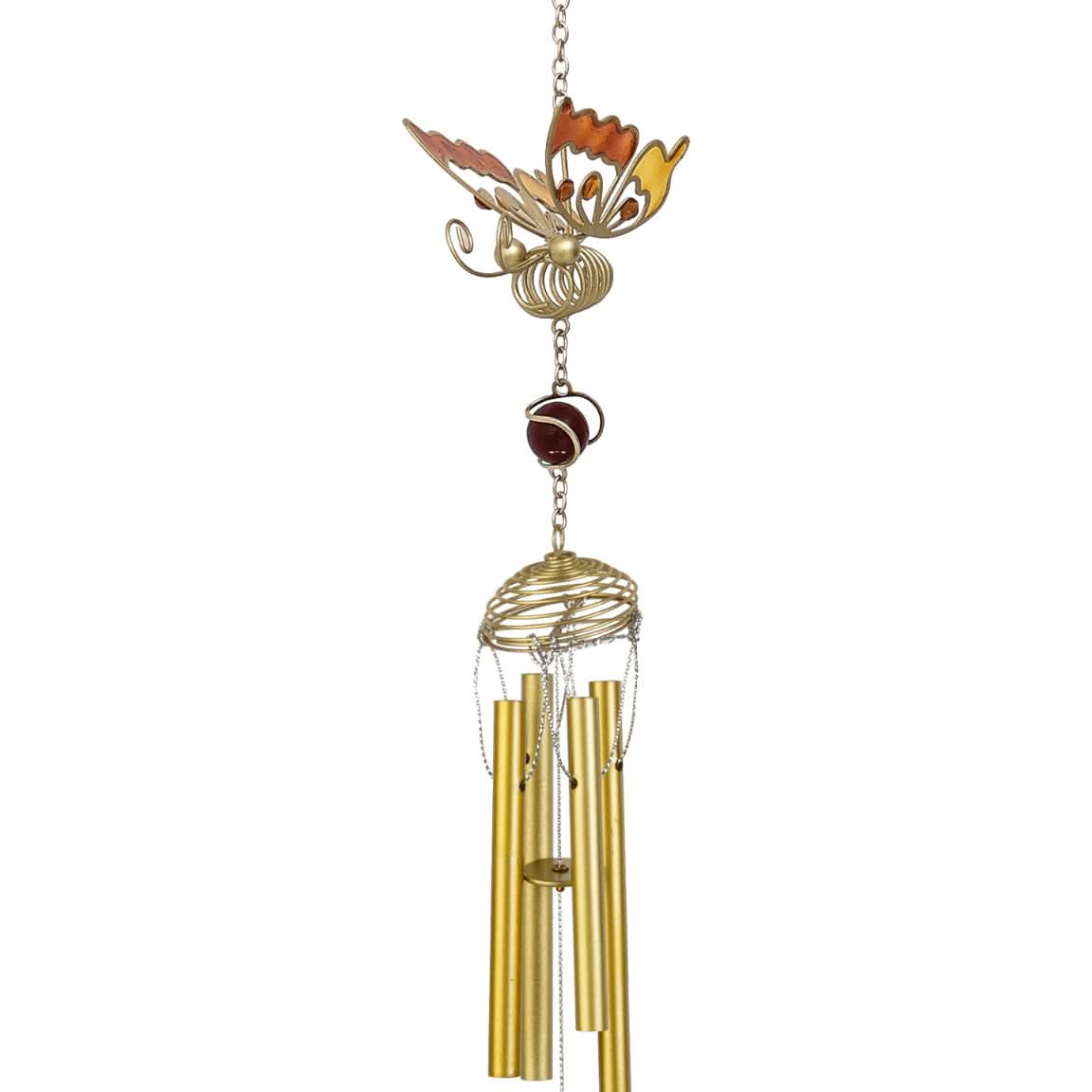 Golden butterfly wind chime with metallic tubes and a red bead, home decor accent.