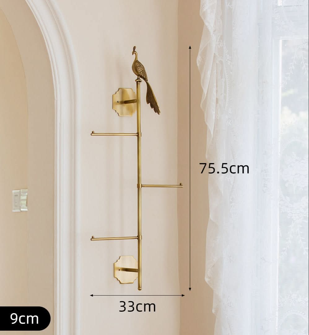 Vintage Brass Bird Branch Wall Hooks with decorative peacock, home decor item.