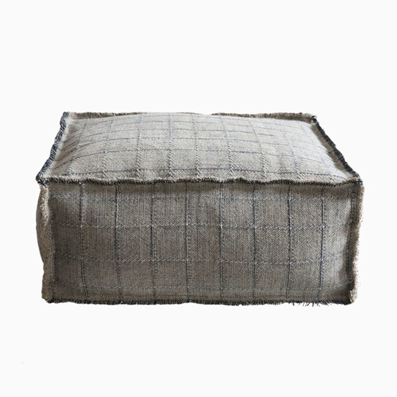 Rustic Square Fabric Ottoman in warm taupe with subtle blue grid pattern.