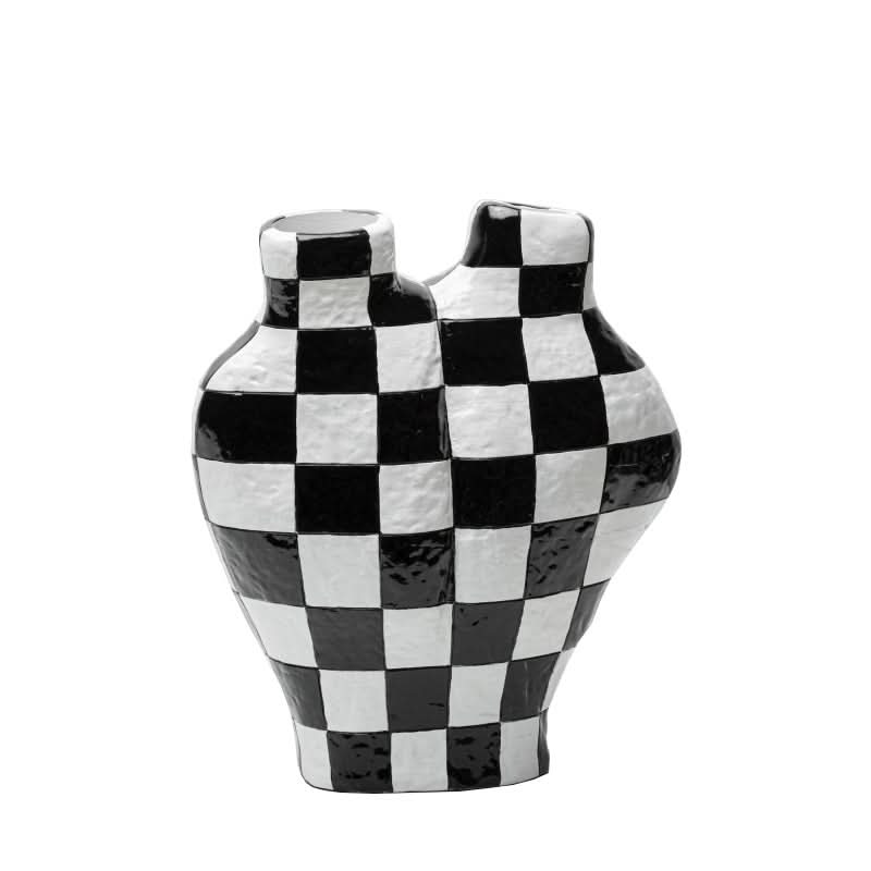 Black and white checkered ceramic vase, textured finish, modern home decor accent.