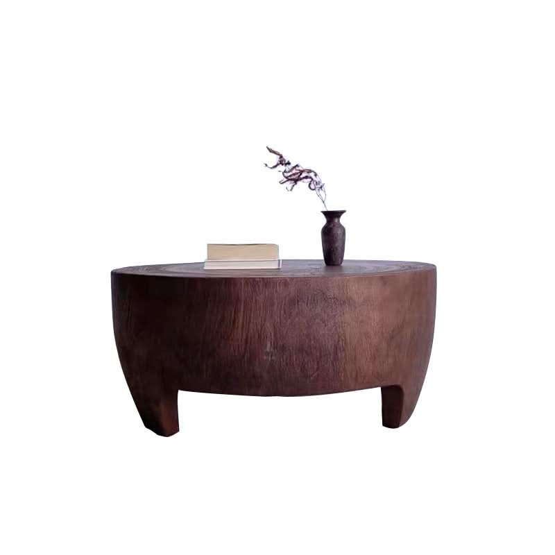 Rustic Raw Wood Coffee Table with books and vase on top, dark brown wood, unique design
