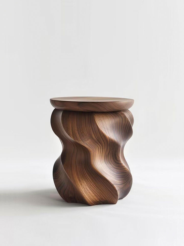 Sculptural walnut wood stool with modern organic design on white background
