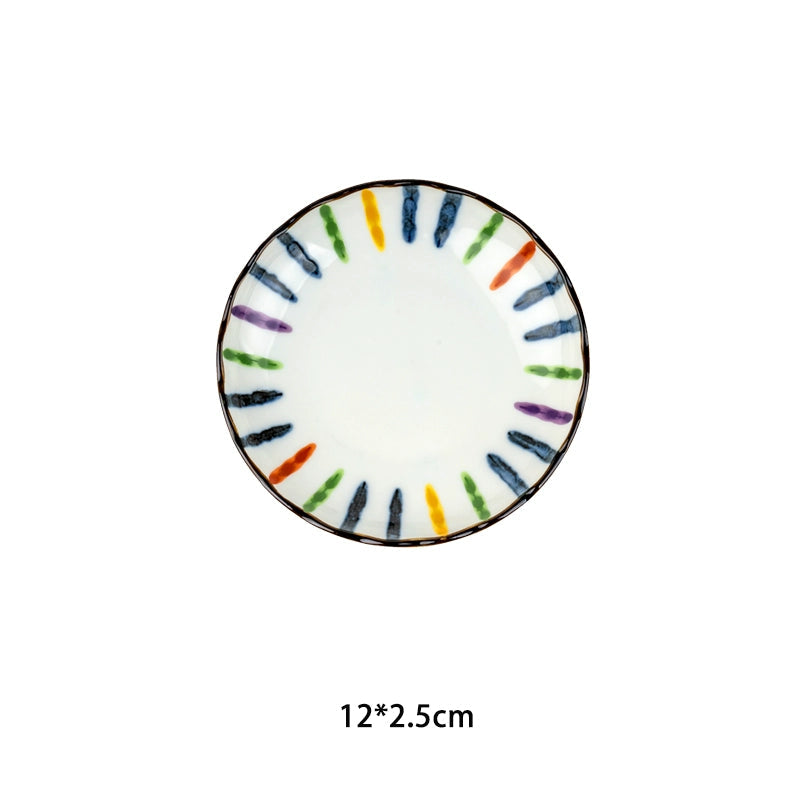 Colorful striped Japanese dinnerware set plate with blue, green, orange, yellow, and purple strokes on white ceramic.