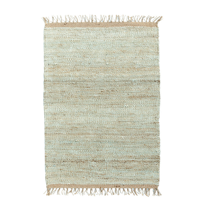 Light green rug with beige fringe.