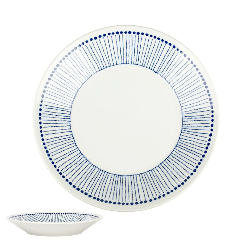 Blue & White Dotted Rim Dinnerware Set: stylish ceramic plates and bowls with blue line design.