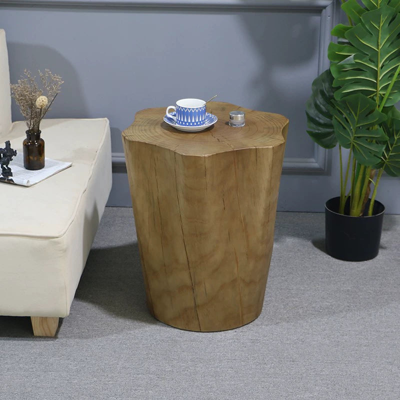 Natural wood log side table, rustic coffee table with cup on top.