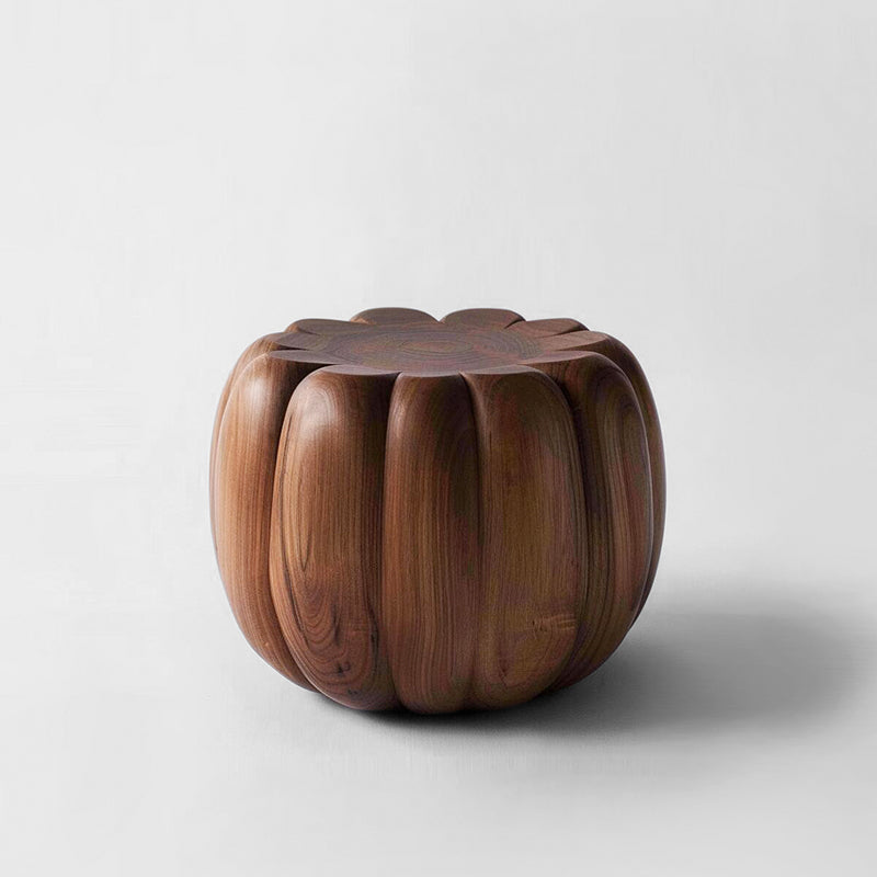 Hand-carved walnut wood pumpkin stool with detailed grain. Home decor accent.