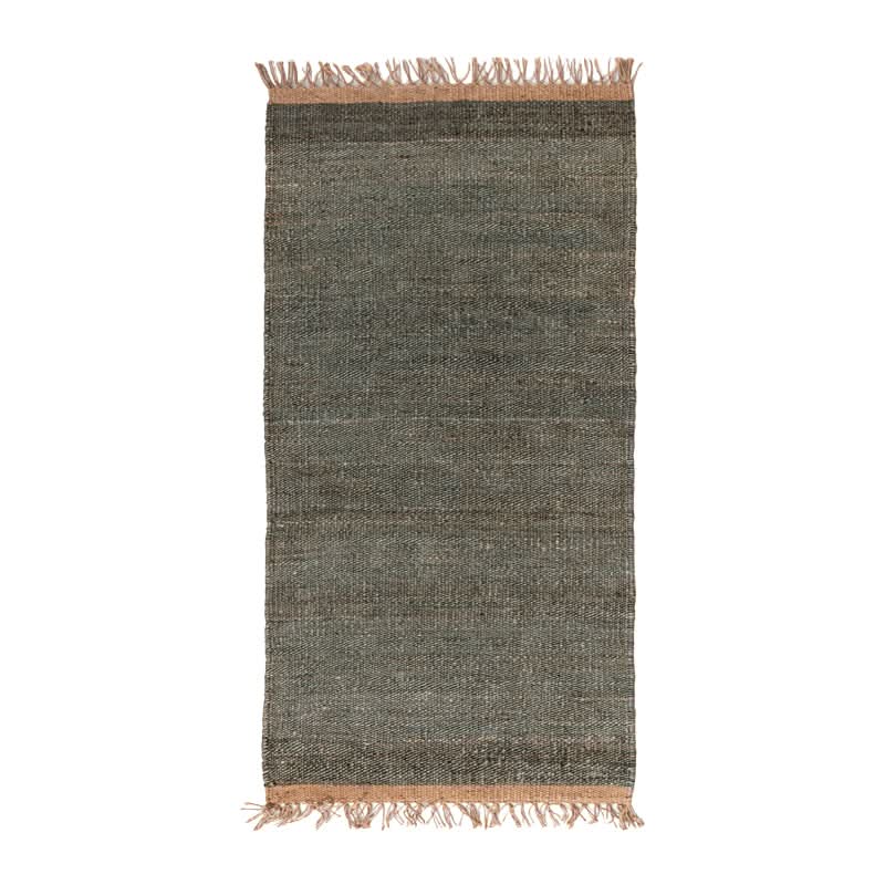 Handwoven Jute Rug - Natural & Rustic. Textured green jute with fringe details.