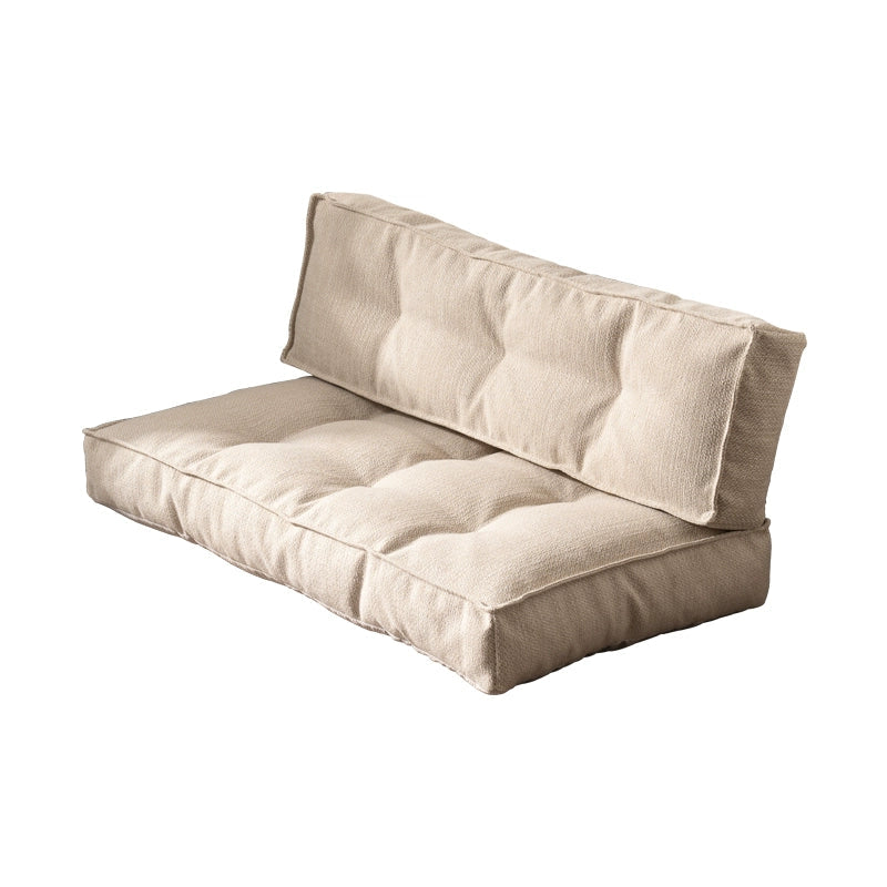 Modern Minimalist Floor Sofa in beige textured fabric, tufted seating, comfortable home decor.