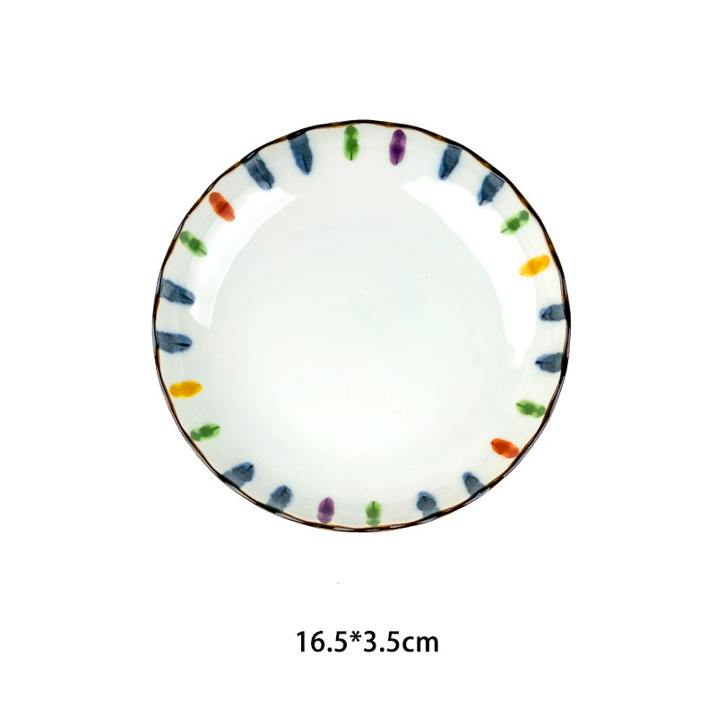 White ceramic plate with colorful dots, part of the Japanese Dinnerware Set.