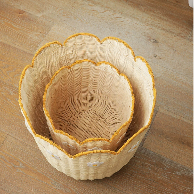 Nested woven baskets, light beige rattan, scalloped edges, yellow trim, daisy embroidery.  Home decor storage.