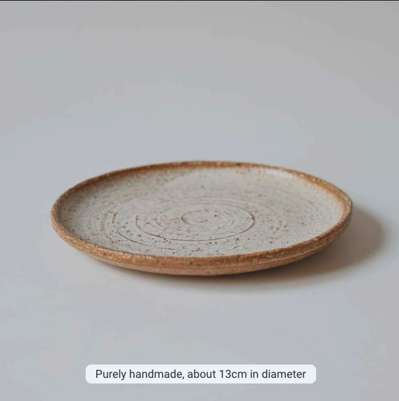 Rustic pottery ceramic plate with natural finish and swirl design. Home Decor.