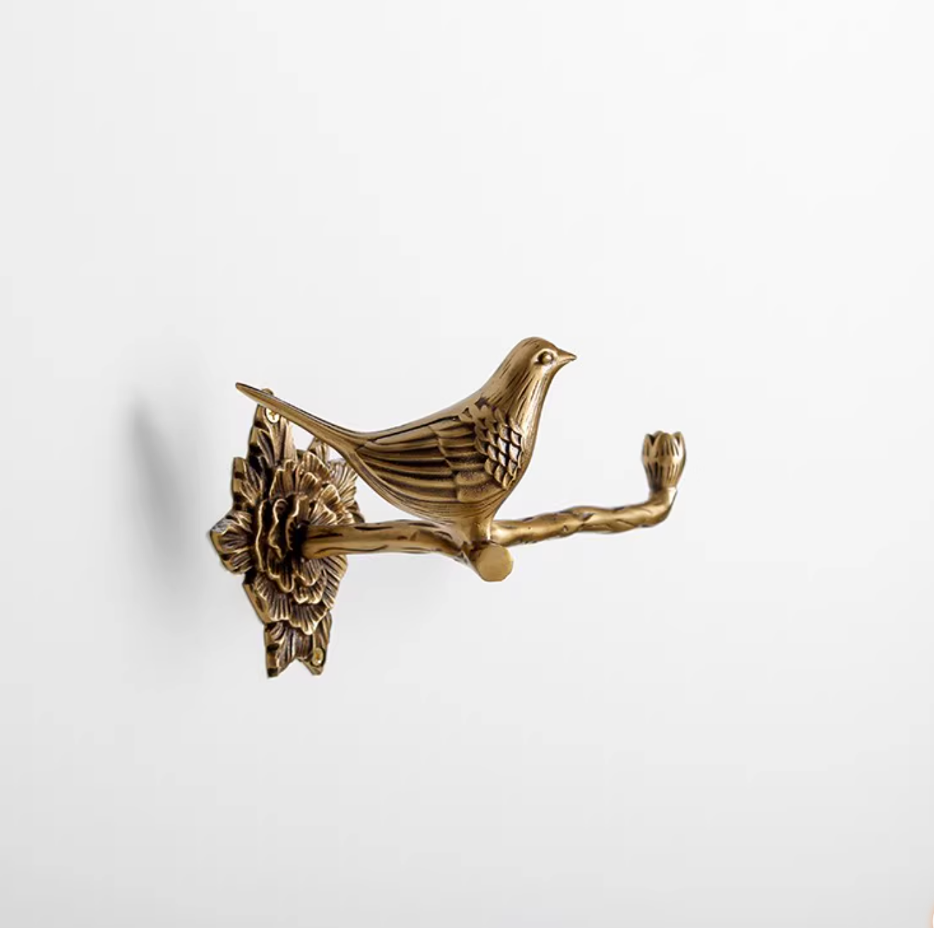 Brass Bird Bathroom Set toilet paper holder on a white background.