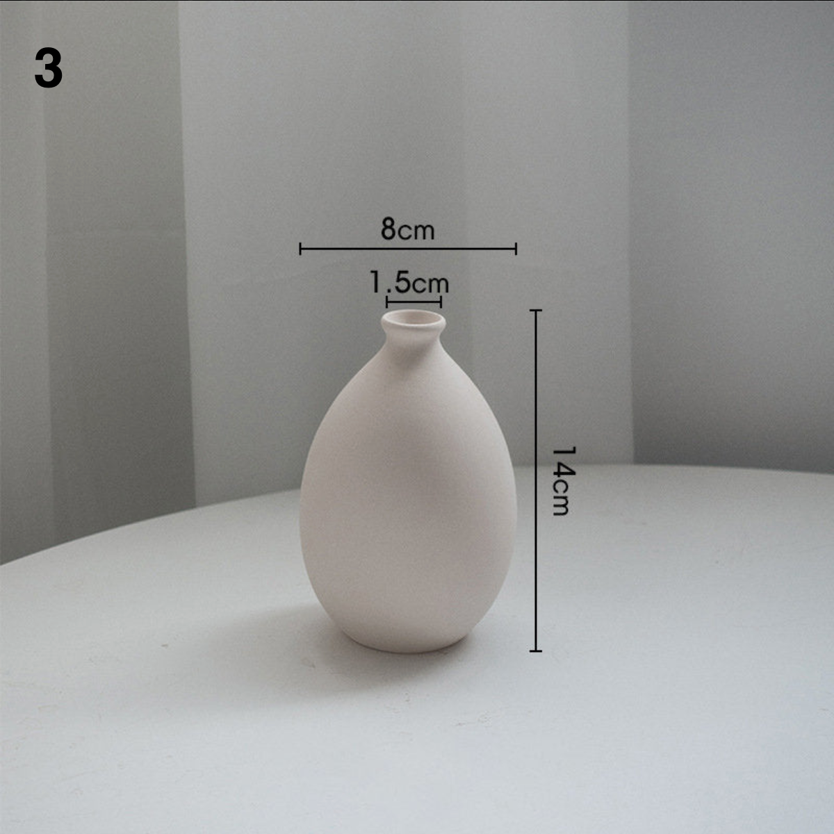 Small beige ceramic vase, 14cm tall, minimalist Nordic style for single flower arrangements.