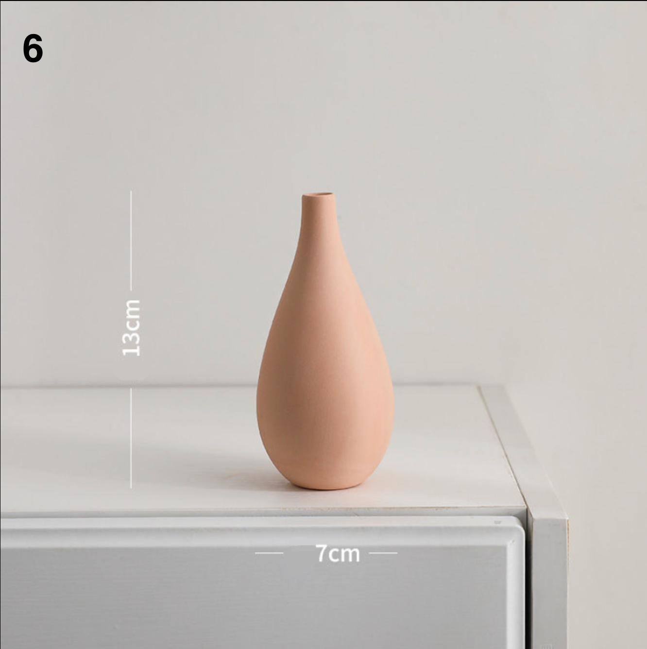 Peach ceramic teardrop vase, minimalist Nordic style, small decorative vase for home decor.