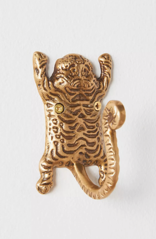 Gold tiger hook from the Tiger-Inspired Bathroom Accessories Set, cast in brass on a white background.