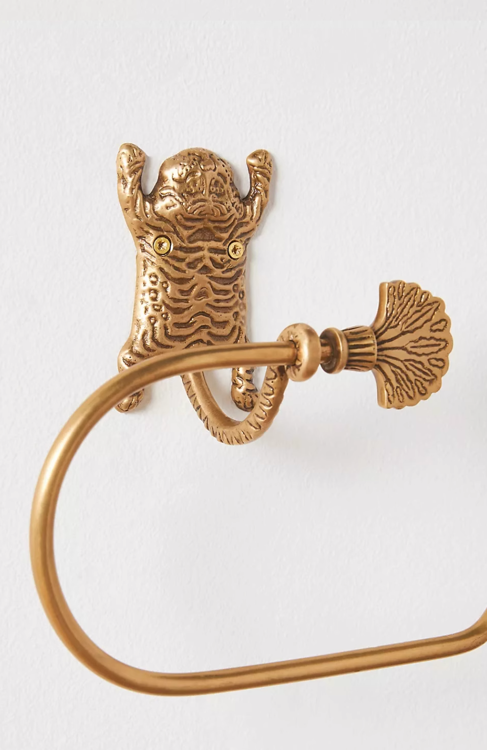 Gold tiger-inspired bathroom accessories set, brushed brass finish, towel holder detail.