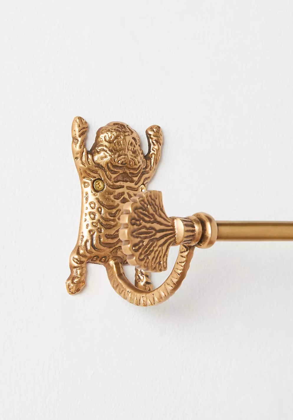 Gold Tiger-Inspired Bathroom Accessories Set detail, brass tiger holder with decorative flourish.