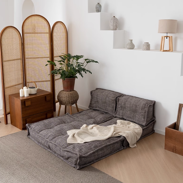 Modern Beige Fabric Modular Sofa: Comfortable, stylish living room furniture laid out on a rug.