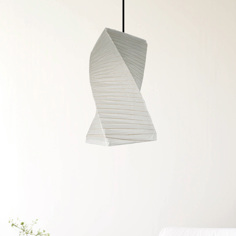 White twisted paper lampshade, a unique home decor accent with textured lines.