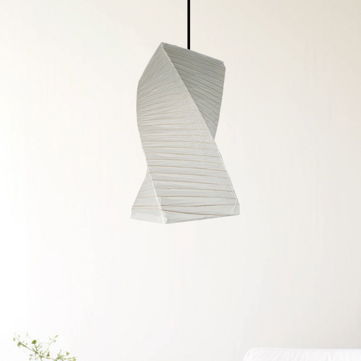 Whimsical white paper lampshade, twisted design.