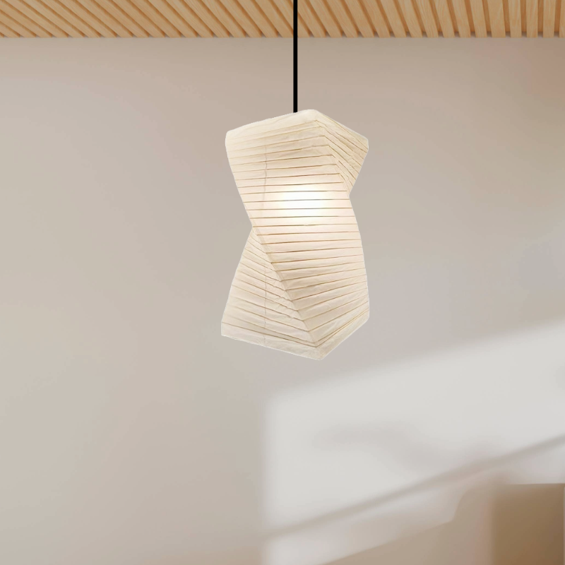 Cream twisted paper lampshade hanging from a wooden ceiling, home decor accent.