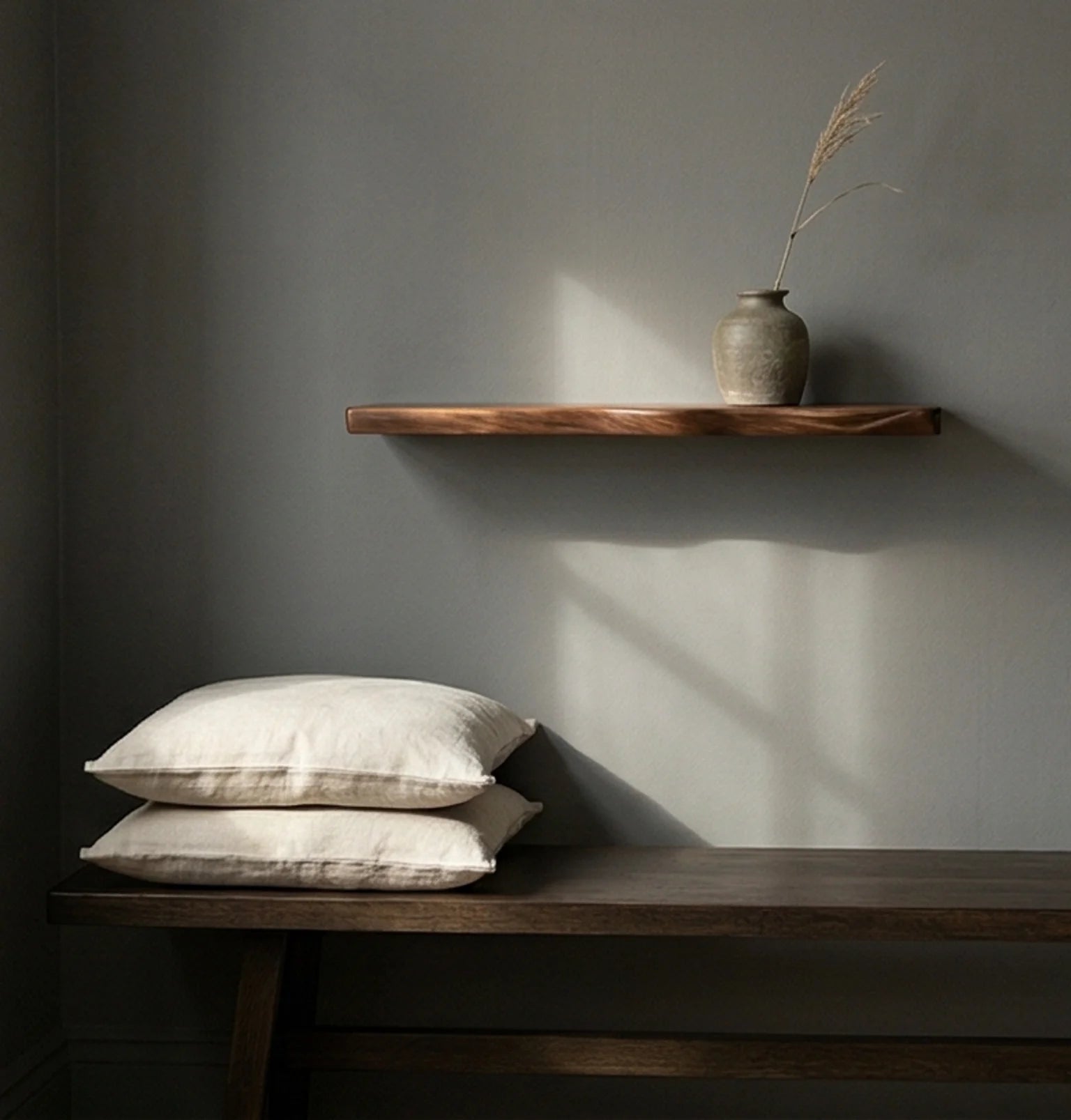 Solid Wood Floating Wall Shelf with Natural Irregular Edge — ambient room context on shelf in soft natural light