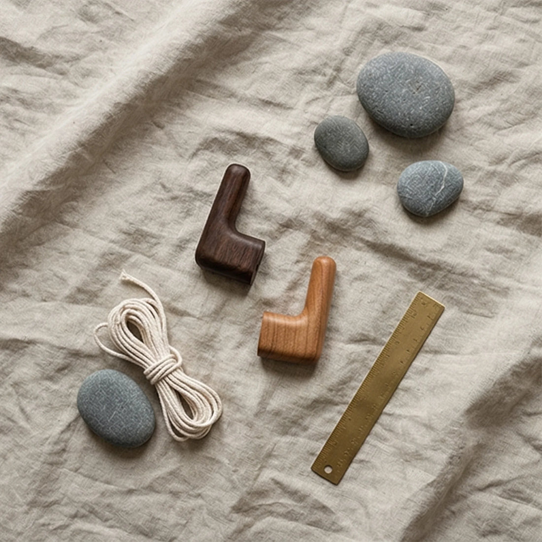 Solid Wood Wall Hook for Coats and Curtain Straps — overhead flat-lay on linen surface