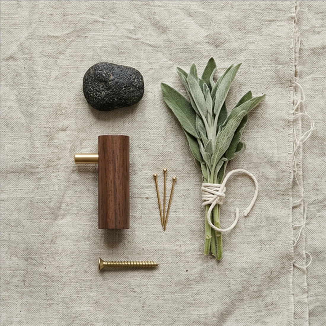 Solid Wood Walnut Wall Hook with Brass Peg for Headphone or Coat Hanging — overhead flat-lay on linen surface