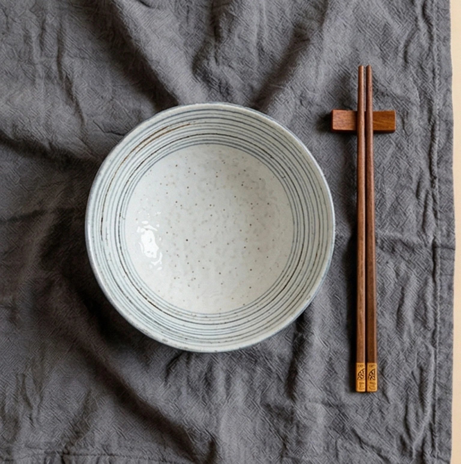 Japanese Style Ceramic Tableware Set - Shino/Wabi-sabi Bowls and Plates — overhead flat-lay on undyed linen surface