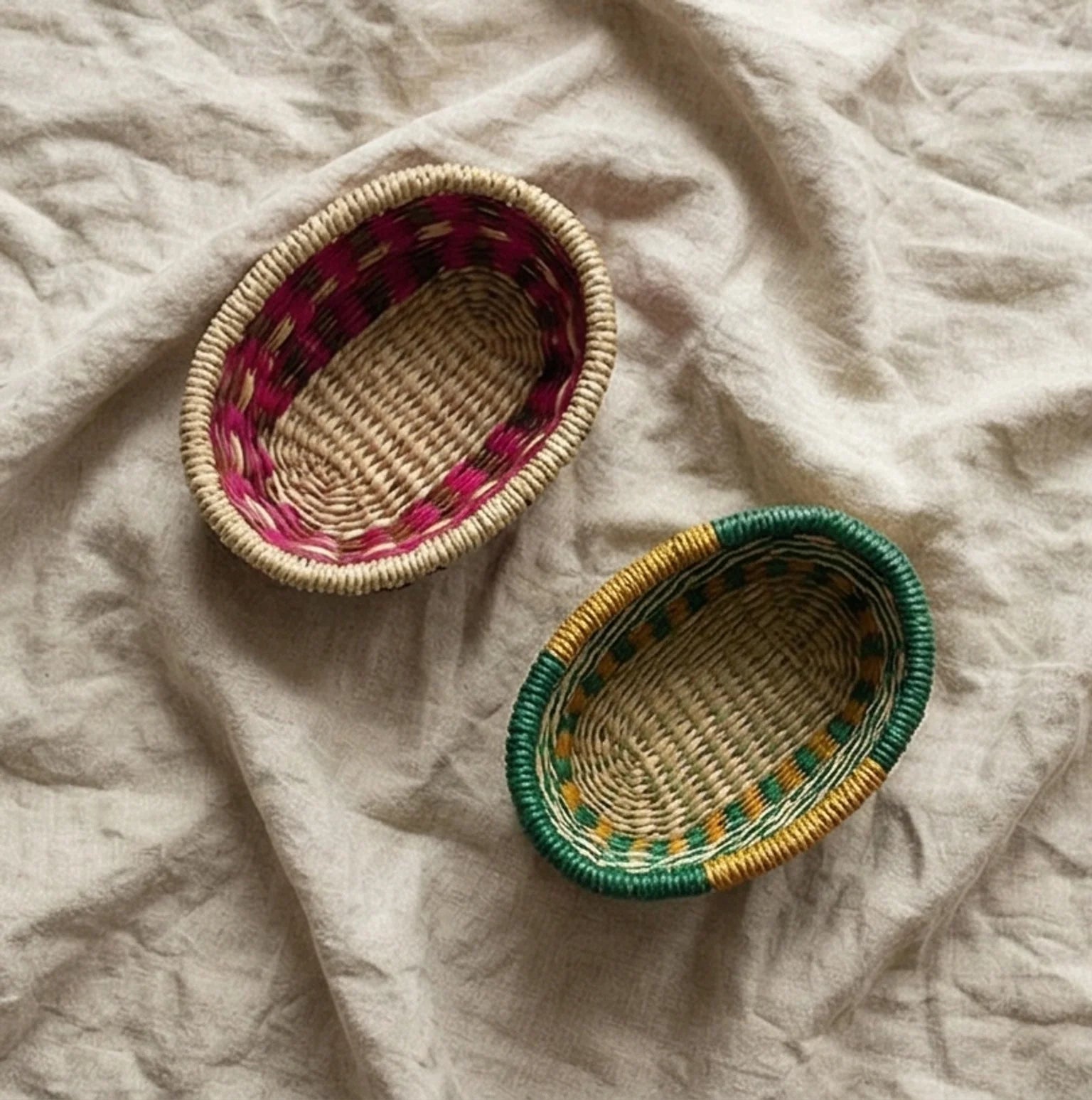 Hand-Woven Sea Grass Storage Baskets - Natural & Colorful — overhead flat-lay on undyed linen surface