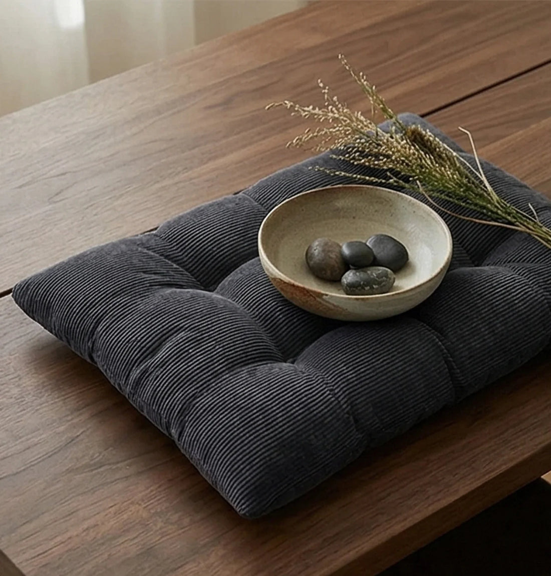 Corduroy Tufted Floor Cushion with Anti-Slip Bottom — lifestyle dining or shelf scene with natural props