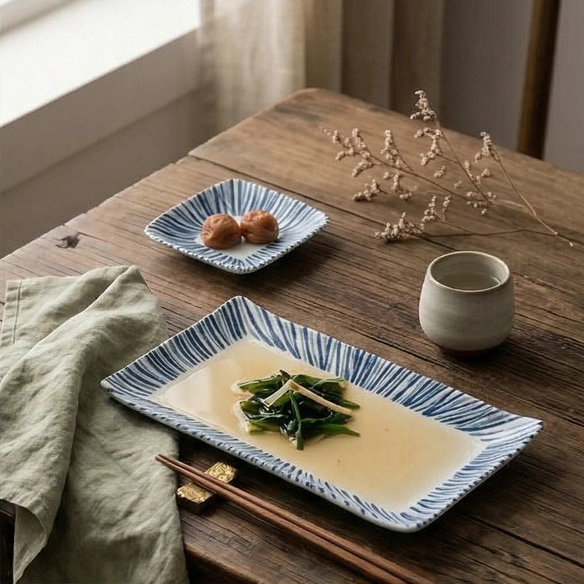 Japanese Style Blue & White Striped Ceramic Dish Set - Rectangular Serving Plates & Saucer — lifestyle dining table scene with natural props