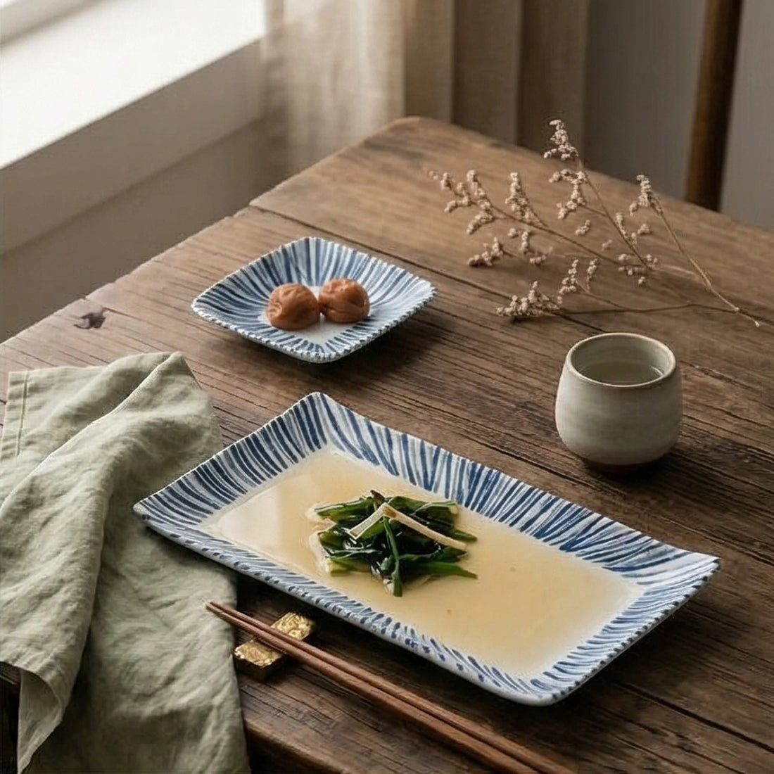 Japanese Style Blue & White Striped Ceramic Dish Set - Rectangular Serving Plates & Saucer — lifestyle dining table scene with natural props