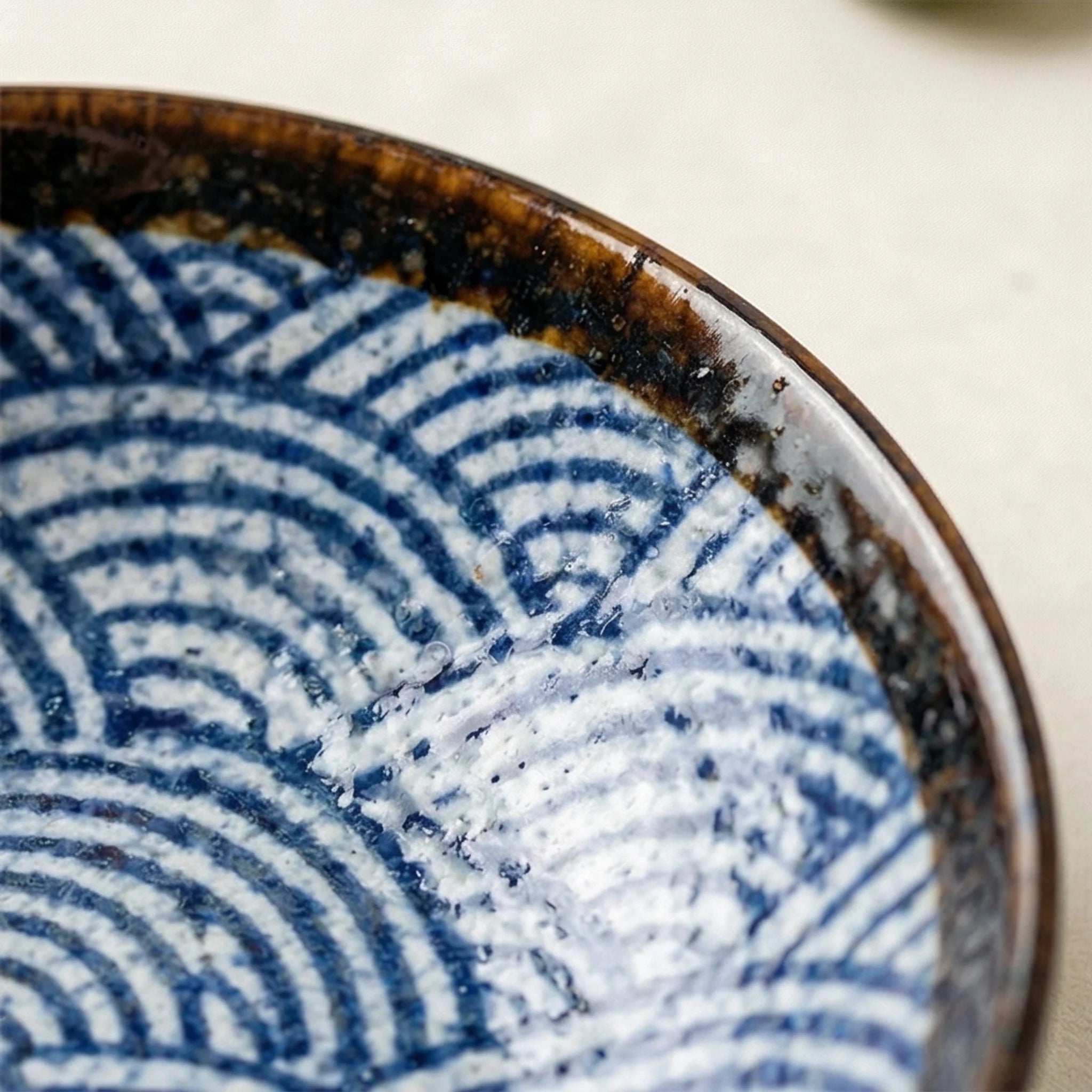 Japanese Style Ceramic Plate Bowl Set - Blue Wave Pattern Tableware — macro close-up of ceramic glaze texture and finish
