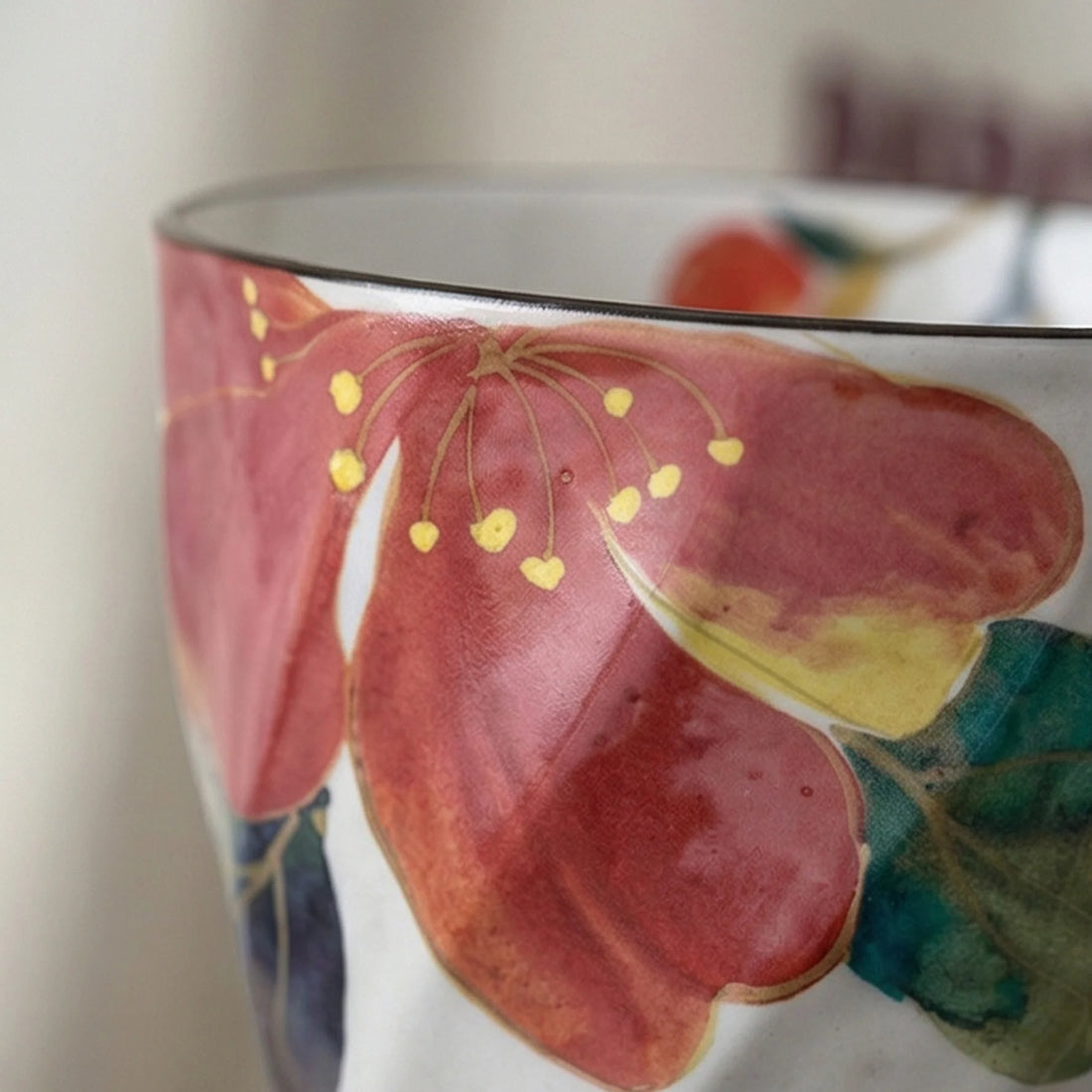 Artistic Floral Ceramic Mug - Underglaze Hand-Painted Style Mug with Unique Faceted Body — macro close-up of ceramic glaze texture and finish