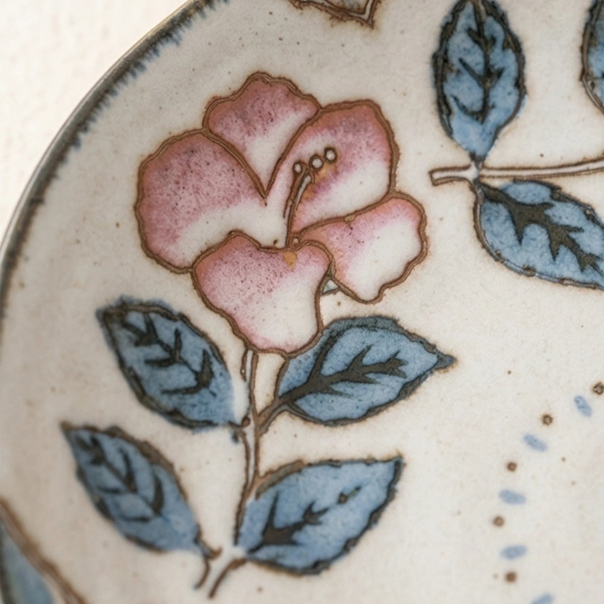 Japanese Style Handmade Ceramic Dinner Plates - Underglaze Painted Floral & Fish Designs — macro close-up of ceramic glaze texture and finish