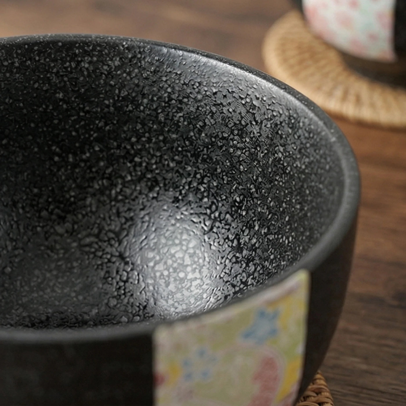 Japanese Style Jian Zhan Oil-Dripping Tenmoku Ceramic Rice Bowl with Washi Decal — macro close-up of ceramic glaze texture and finish