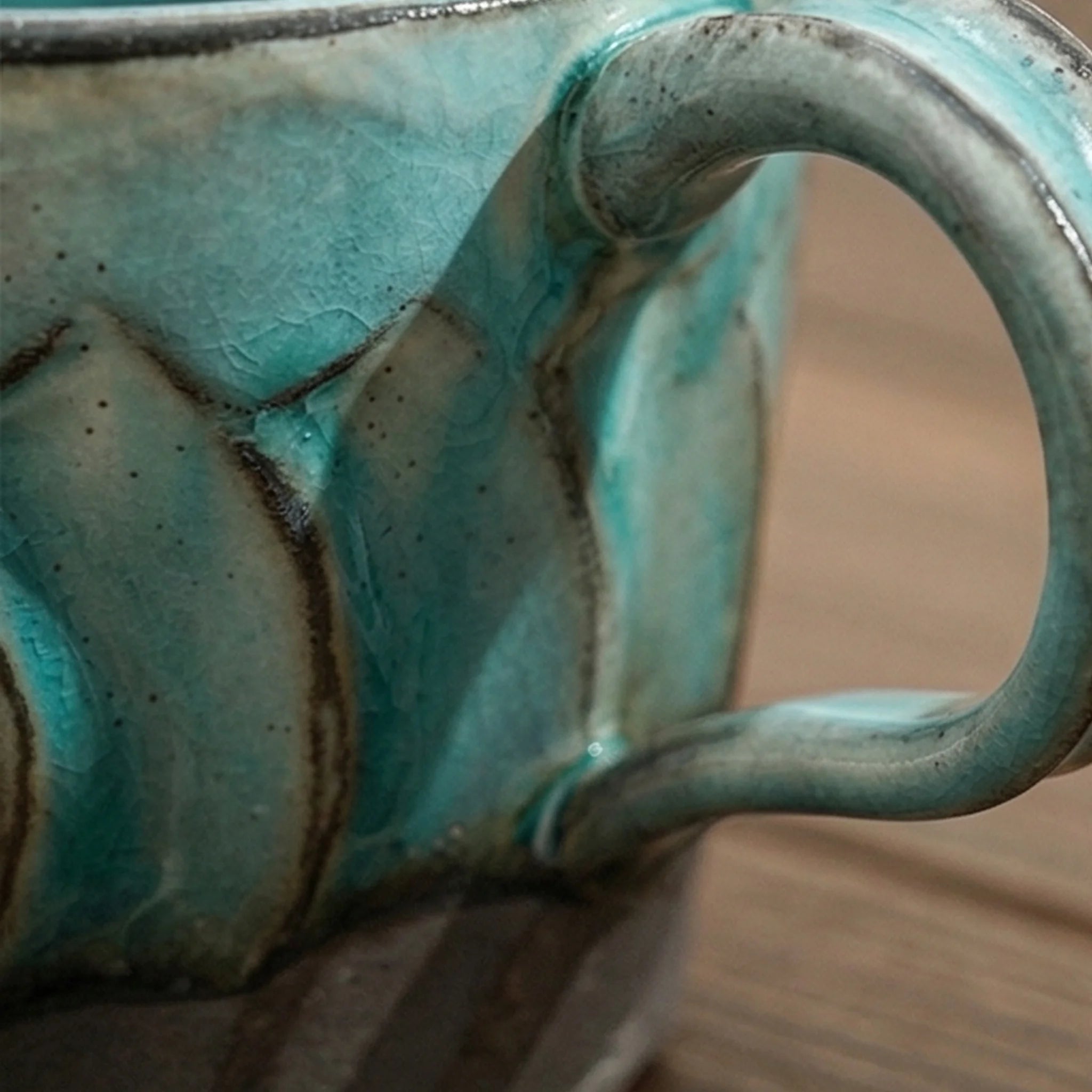 Handcrafted Japanese Ceramic Coffee Cups - Fluted Design, Artisan Glazes (Crane Gray, Peacock Blue, Fairy White) — macro close-up of ceramic glaze texture and finish