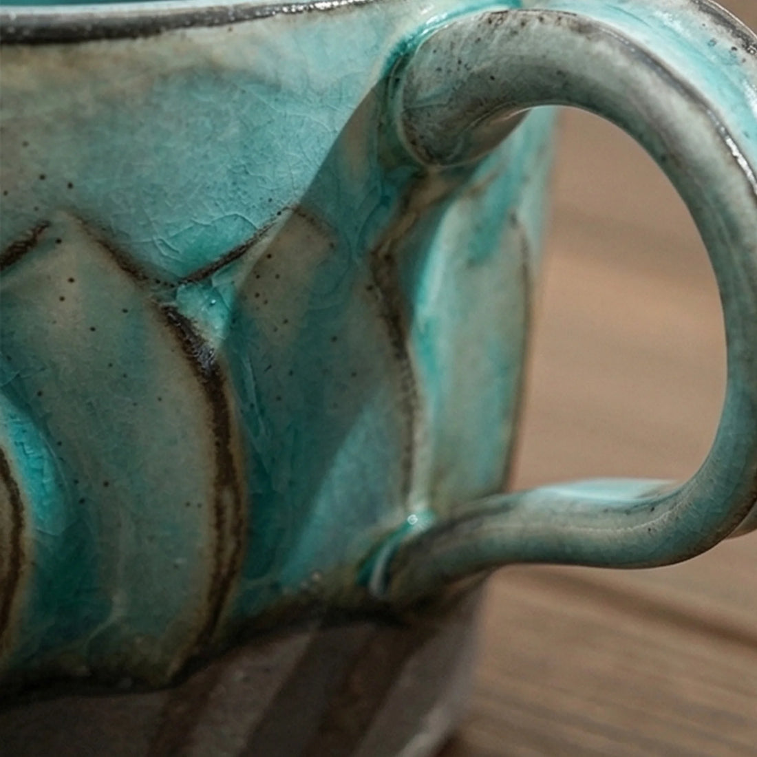 Handcrafted Japanese Ceramic Coffee Cups - Fluted Design, Artisan Glazes (Crane Gray, Peacock Blue, Fairy White) — macro close-up of ceramic glaze texture and finish