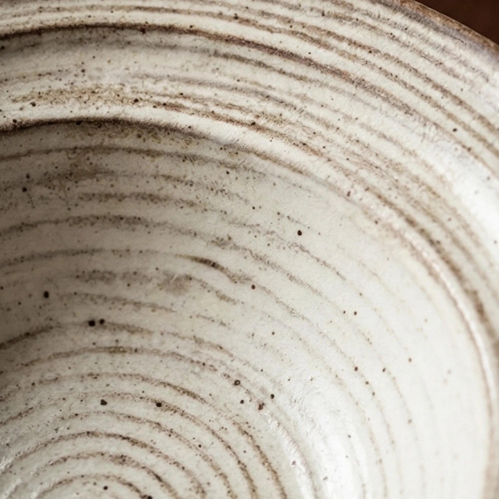 Rustic Handmade Ceramic Bowl with Spiral Texture - Jingdezhen Pottery Dinnerware — macro close-up of ceramic glaze texture and finish