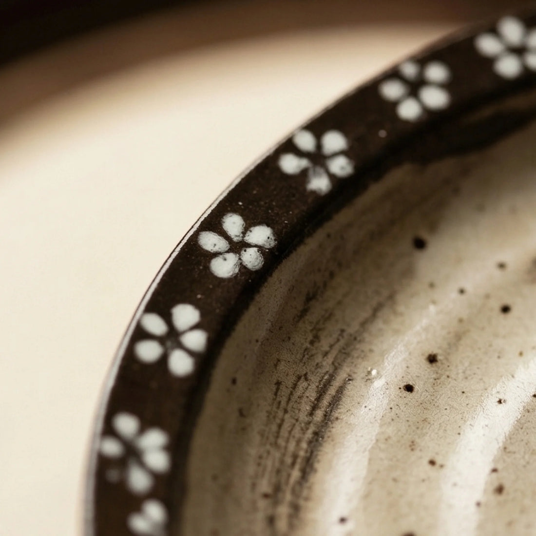 Rustic Handmade Ceramic Oval Serving Platter with White Flower Rim - Japanese Style Dinnerware — macro close-up of ceramic glaze texture and finish