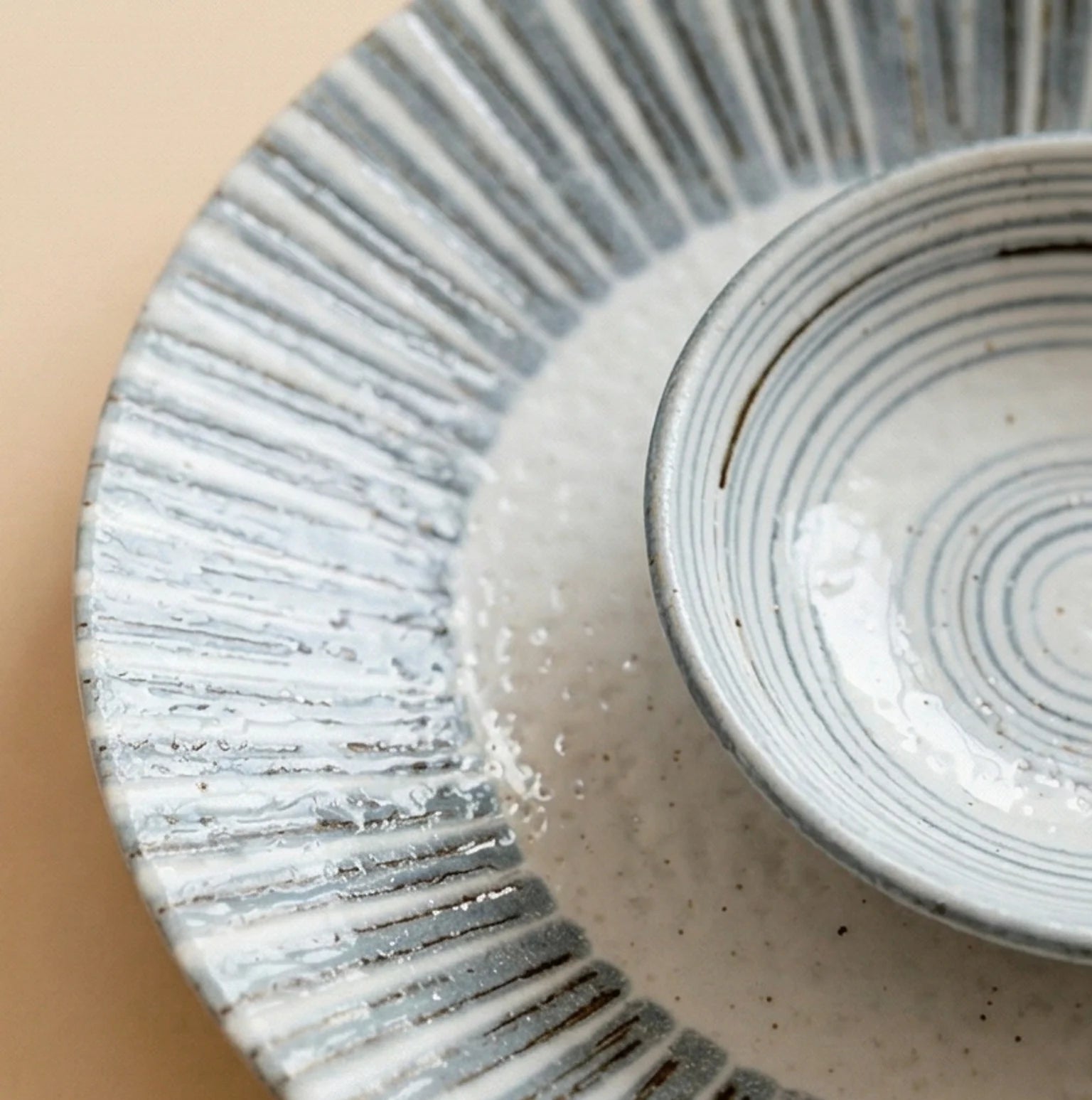 Japanese Style Ceramic Tableware Set - Shino/Wabi-sabi Bowls and Plates — macro close-up of material texture and finish