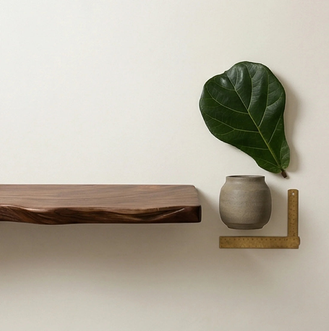 Solid Wood Floating Wall Shelf with Natural Irregular Edge — scale reference alongside natural prop